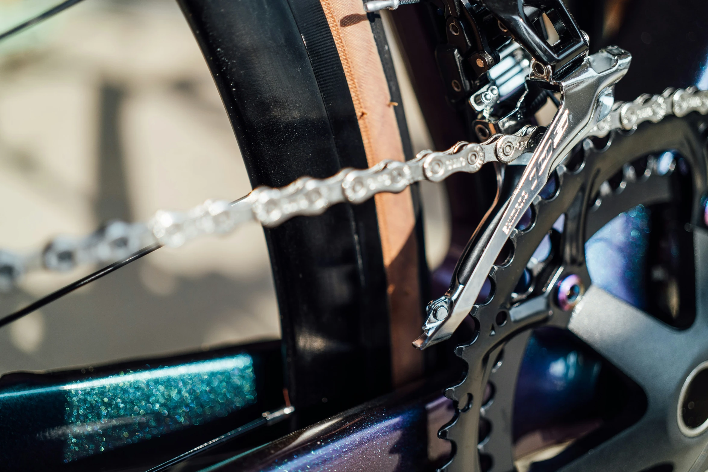 a close up s of a bike chain attached to a bicycle