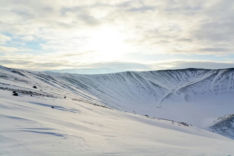 a person skiing down a snow covered mountain