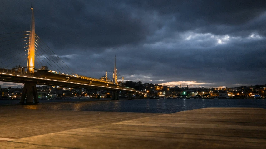 a bridge that has a tall tower in it