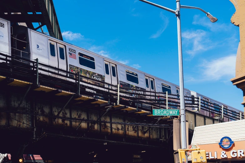 the large train on top is traveling along