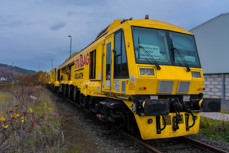 a train is seen coming down the train tracks