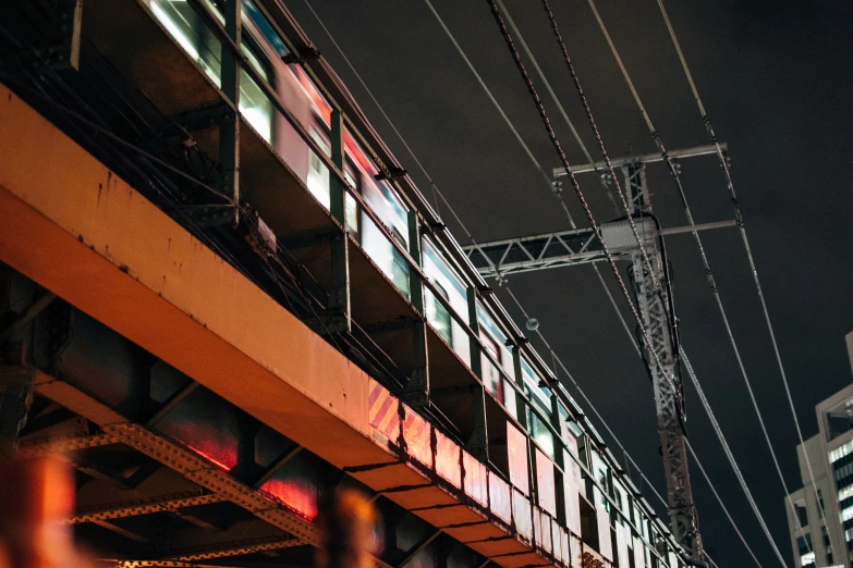 a street light suspended over the street by wires