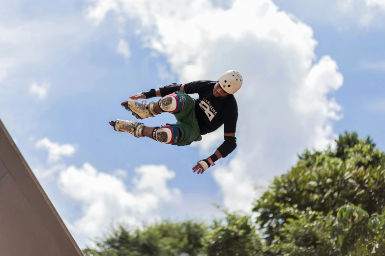 skate boarder jumps on his board in the air