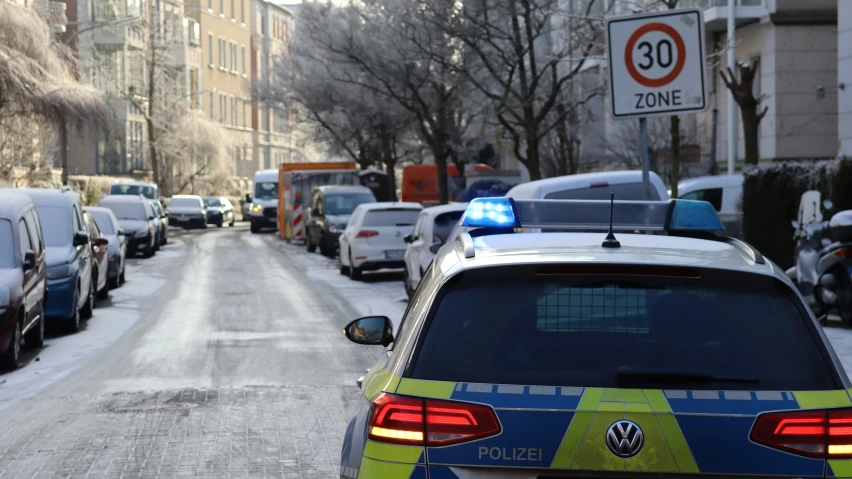 there are police cars parked on this street