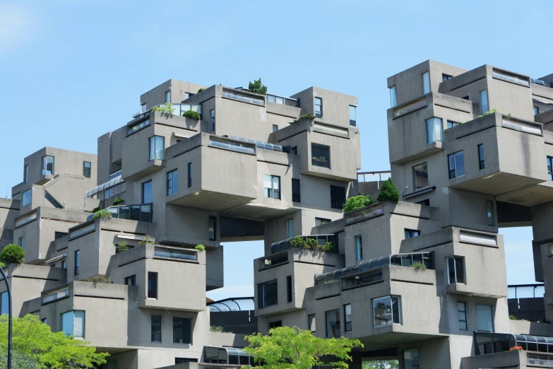 a tall multi story building with multiple balconies attached