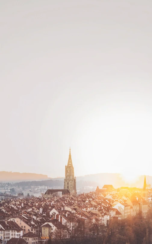 a large clock tower towering over a city