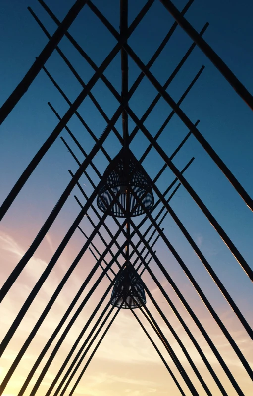 a long metal structure with a clock on the top of it