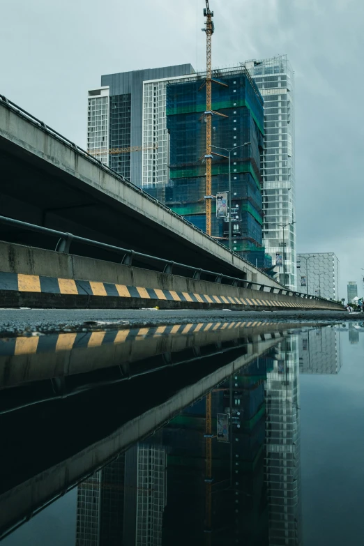 view of an elevated city skyline from the water