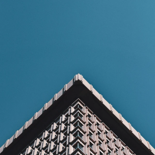 the corner of a building on a sunny day