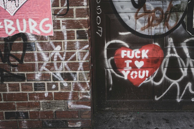 the door of a garage covered in graffitti