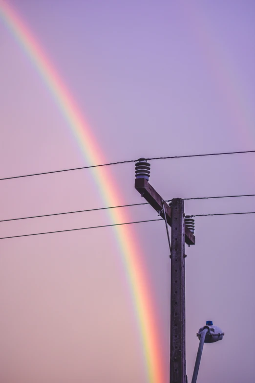 the sky has been purpled by a rainbow