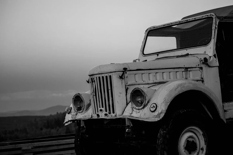 black and white pograph of an old military truck