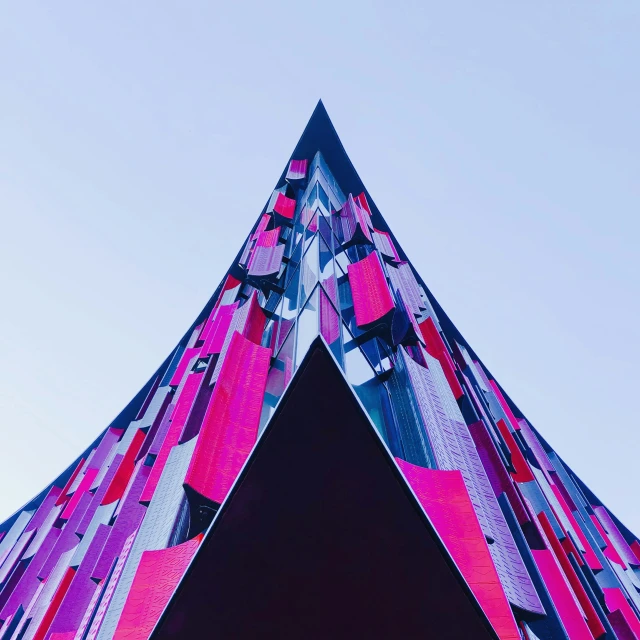 there is a triangular design made of several different colors
