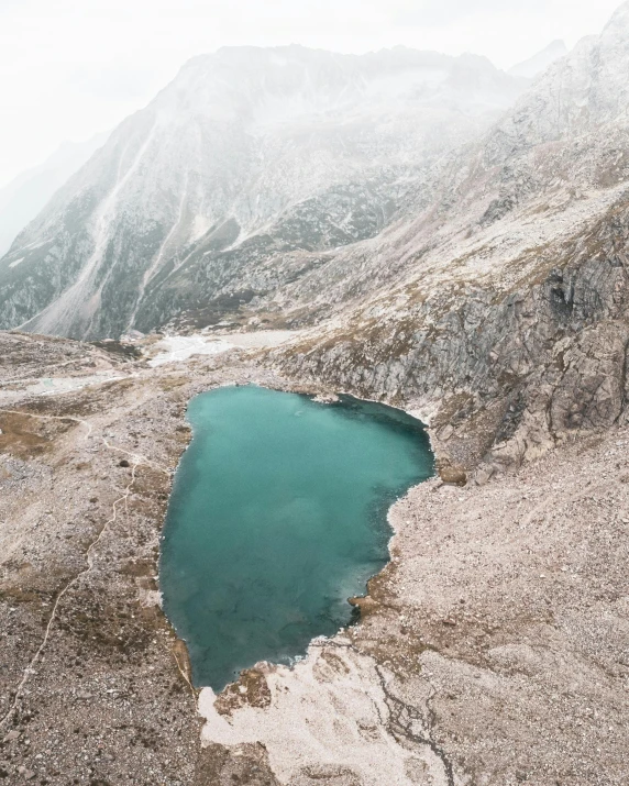 the water is green in a mountain lake