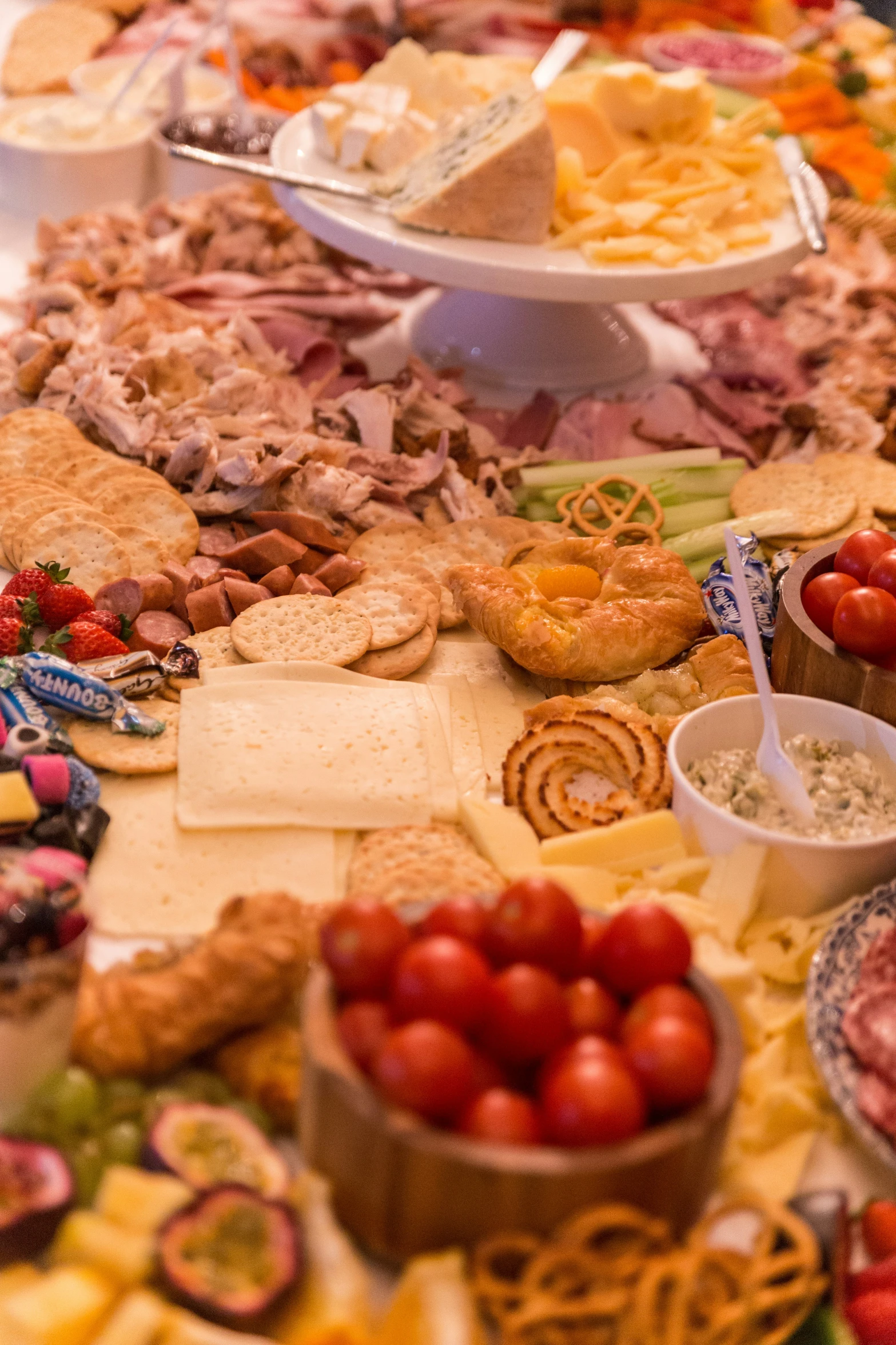 assorted snacks and pastries displayed on large platters