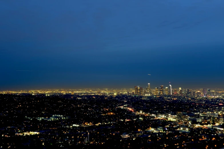 city lights at night, overlooking from above the city