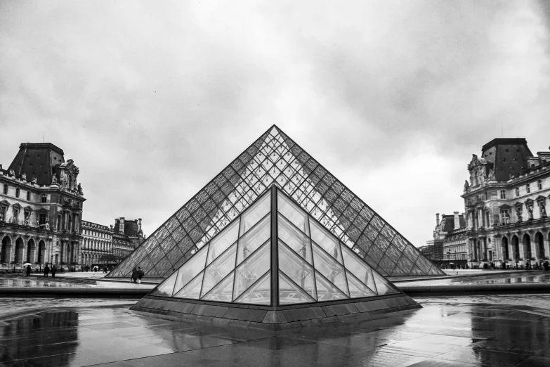 the pyramid of glass is built inside a museum