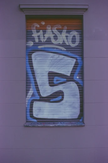 a sign on a building that says six