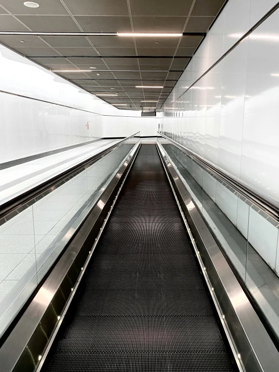 the empty escalator at the airport is very blurry