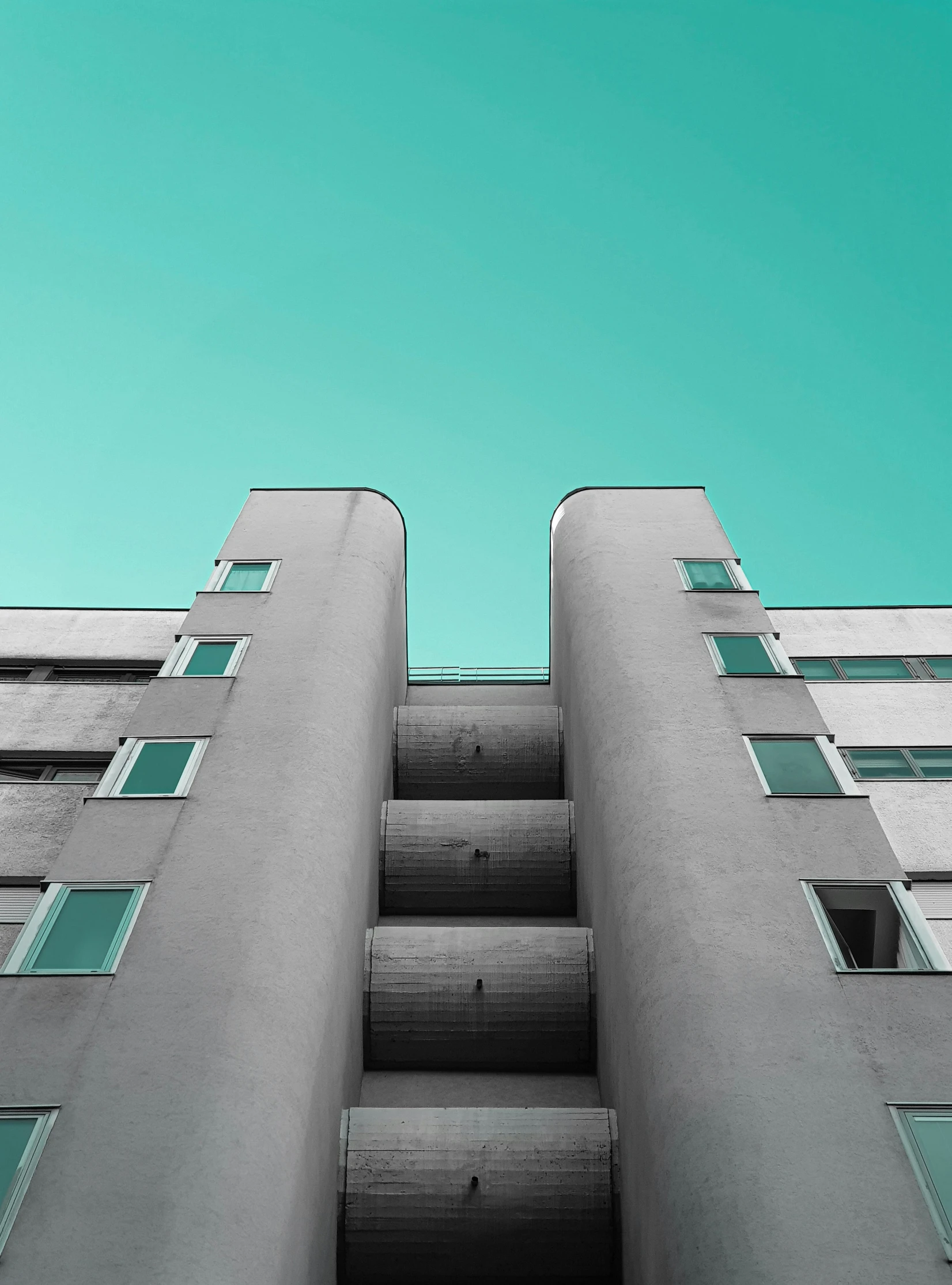 a view up the outside of a tall building