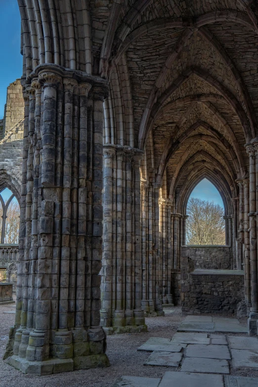 the ruins and arches of an old building