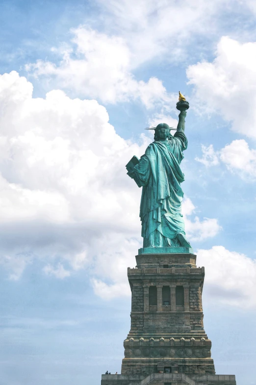 the statue of liberty is shown from across the water