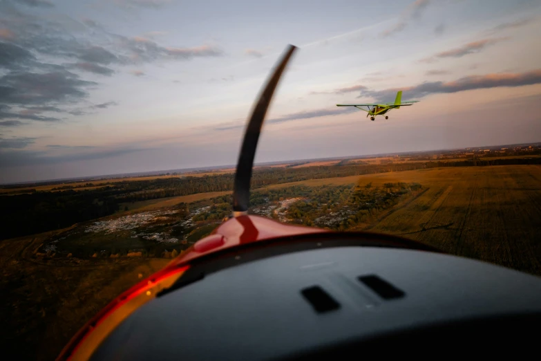 a small plane is flying in the air