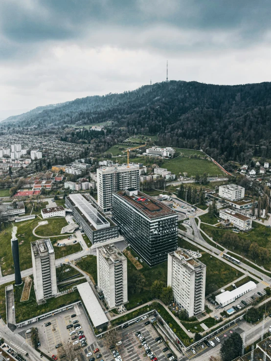 an aerial view of a large city with many buildings in the middle