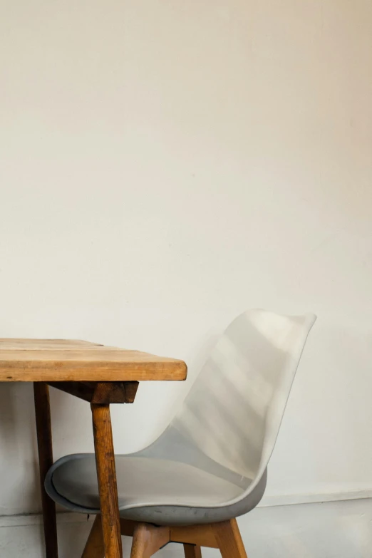 a pair of chairs sitting at a small table