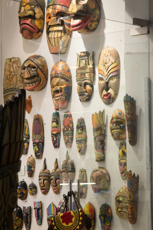 many maskes on display with focus on one another