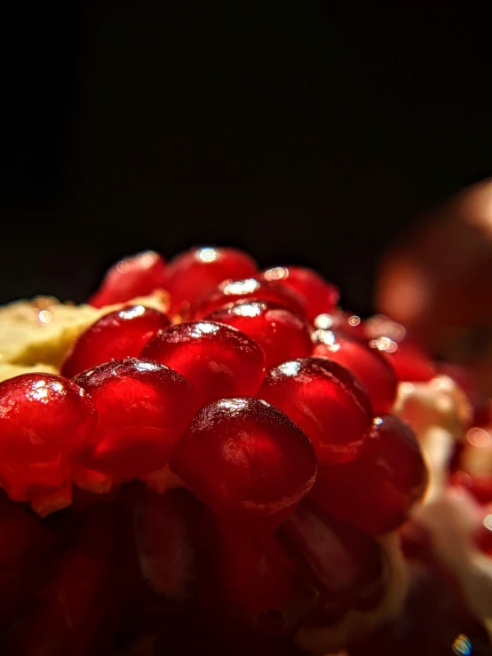 a cluster of red gs sit on the counter