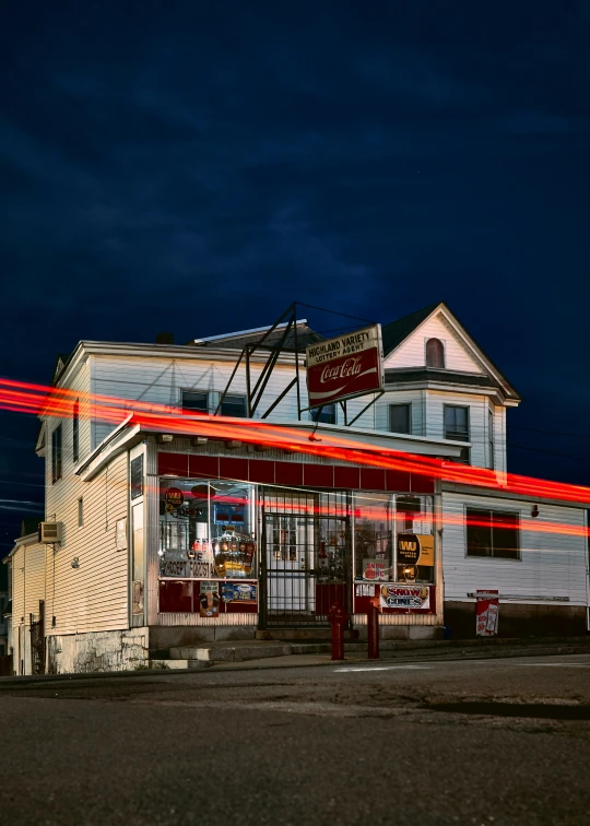 long exposure pograph of a gas station on a dark day