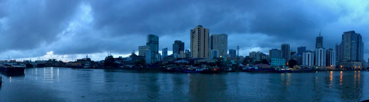 a large city skyline sitting on top of a lake