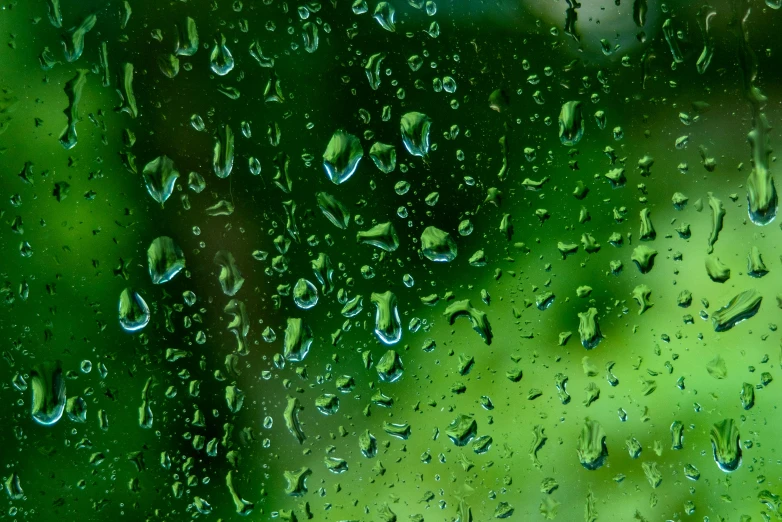 a close up po of rain on the window