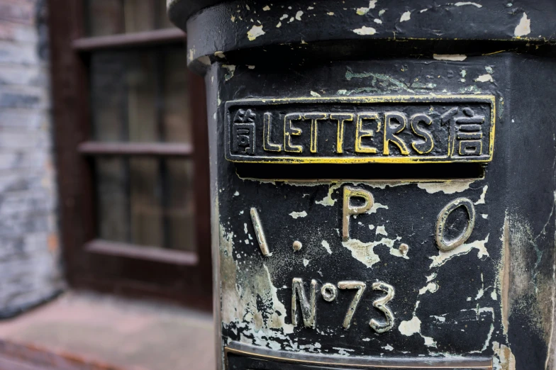 the letters on the front of a mailbox