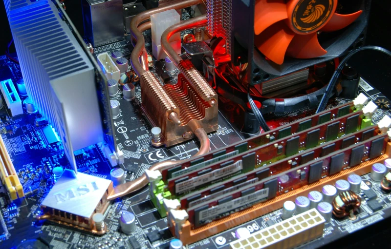 a motherboard with multiple parts exposed to the side