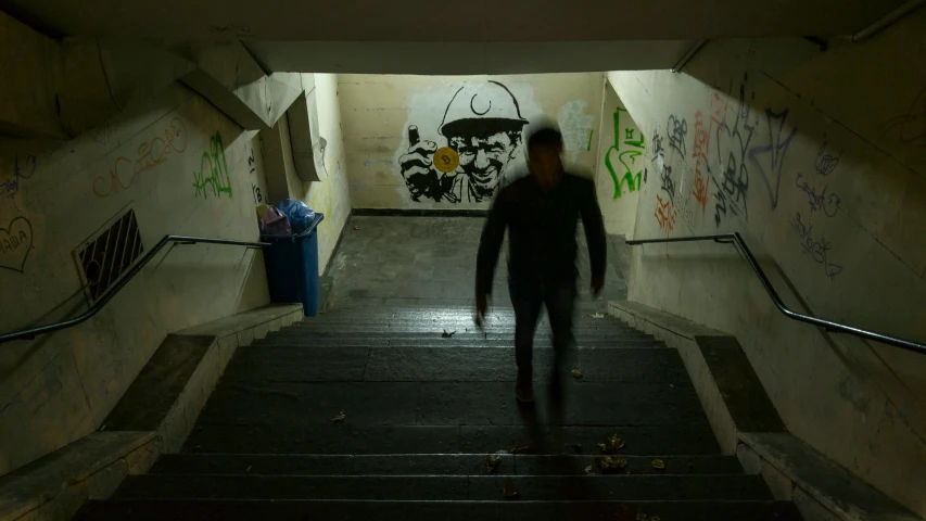 a woman walking down a stairway in an old building