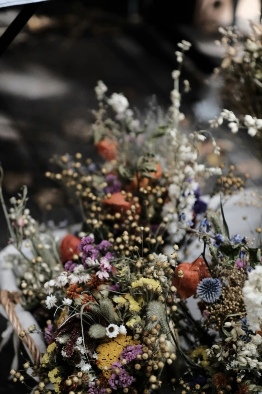 a bouquet of wild flowers in a pile