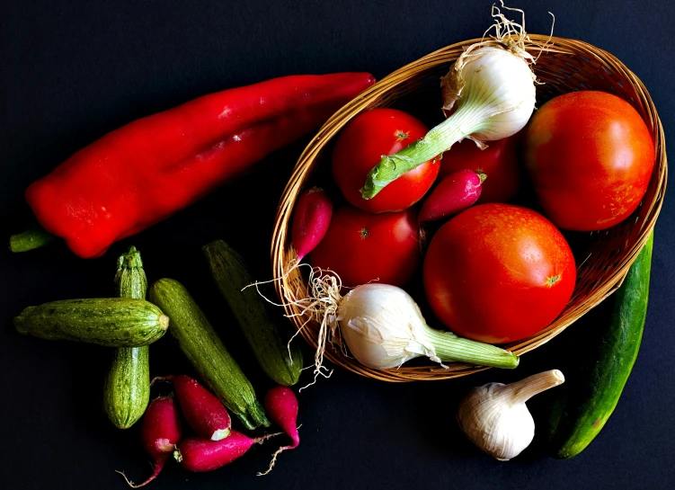 vegetables and eggs are on display in baskets