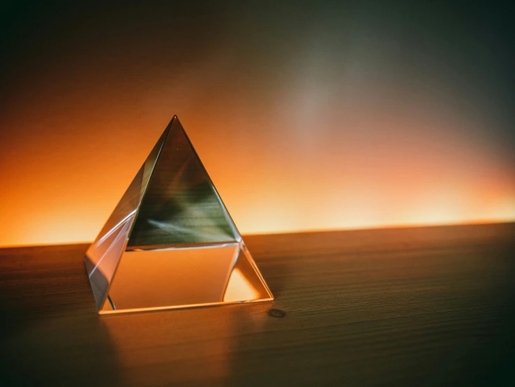 a triangular object standing on a table