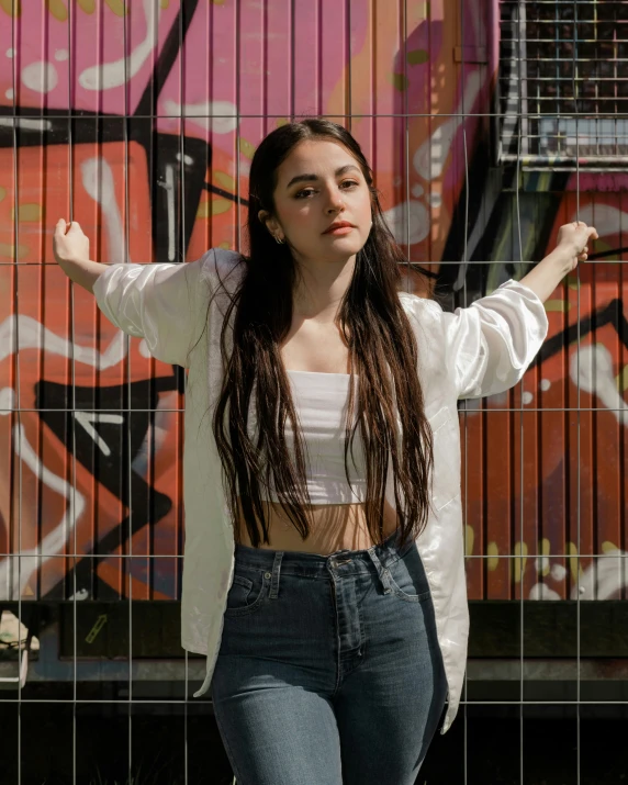 a beautiful young lady wearing high waist jeans