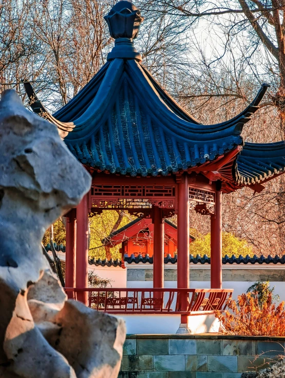 an oriental pagoda in the middle of trees