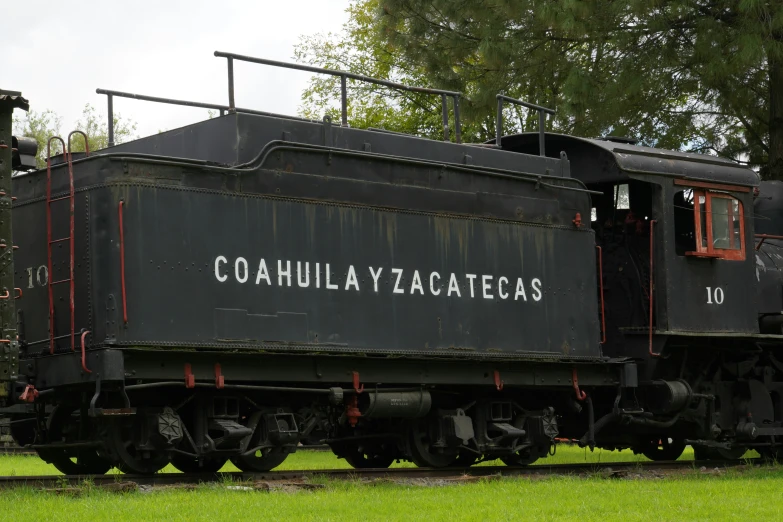 an old train is traveling down the tracks