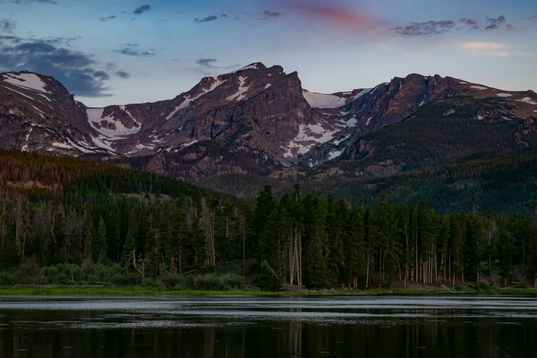 the mountain landscape looks beautiful against the clear skies