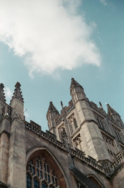 a church tower has steeple like designs on the walls