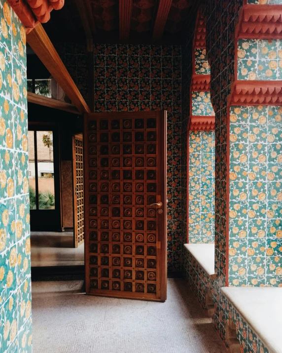 a wood and tile room with a door