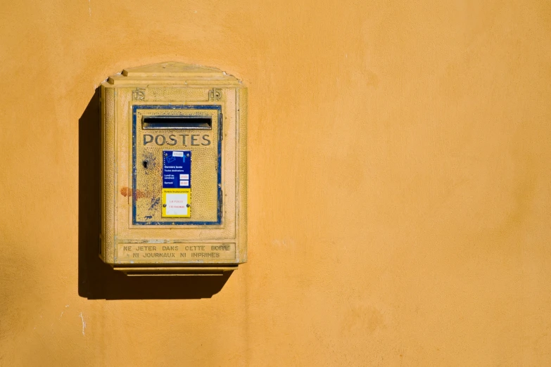 a mailbox on the wall has no letters