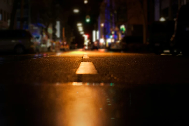 a view of an open street at night