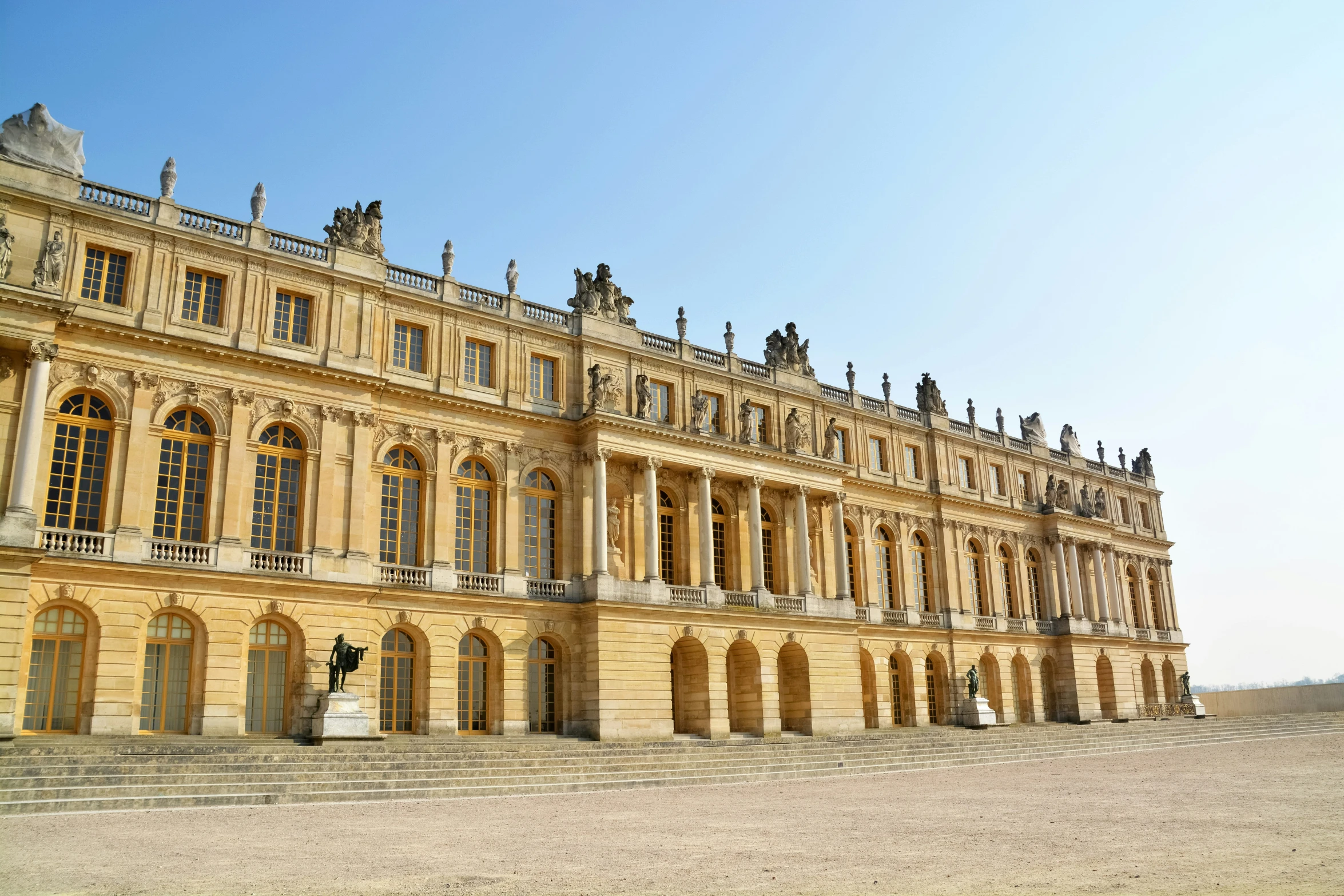 a long palace with lots of windows and balconies