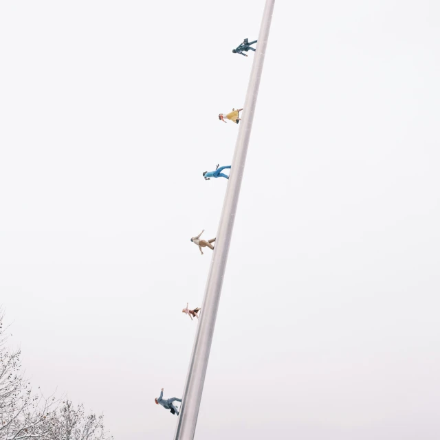 several airplanes that are all lined up on a pole